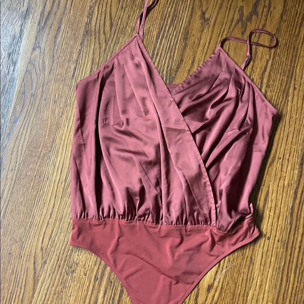 Express Light Coffee colored bodysuit with snaps, neverworn,excellent condition
